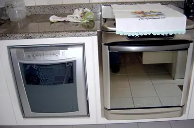 Cozinha planejada: nichos sob medida para lava-louças e forno